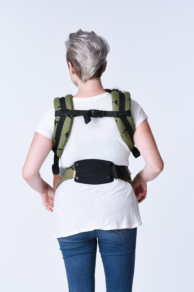 Baby carrier with back support top